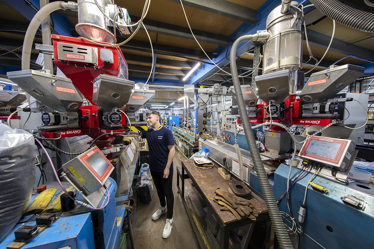 Wilks staff member overseeing the production line