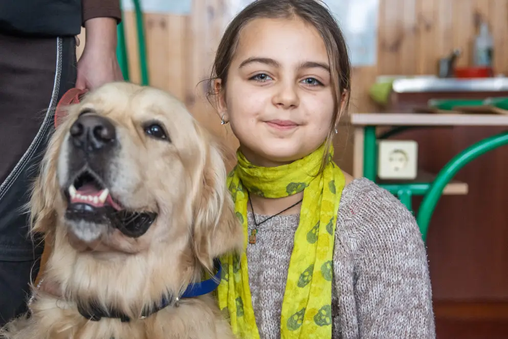 An image of Viktoriya with her therapy dog Parker.